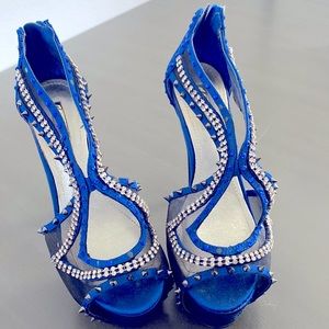 Blue studded high heels, like new. Only wore once.. some rhinestones are missing